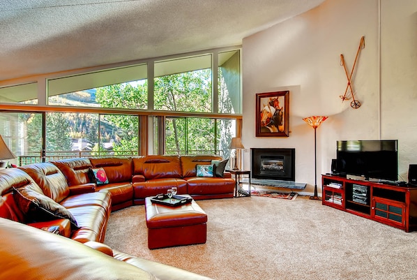 Living Room, with gas fireplace, flat screen TV and DVD player