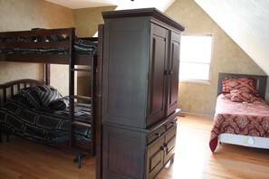Loft sleeping area, bunk beds plus two single beds