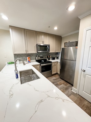 Newly updated kitchen with brand new, gorgeous counter tops.