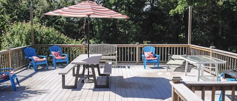 Deck just off the Kitchen.  Huge Sunny And Great for all post beach activities. 