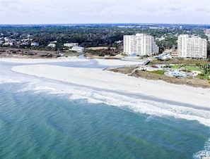 The creek divides the beach at Ocean Creek with Briarcliffe Acres to the south. 