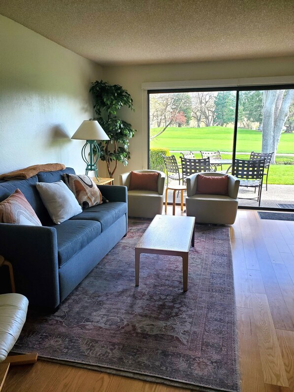 Living room with golf course view