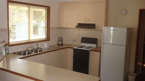 Kitchen - Microwave, fridge, stove and all utensils.