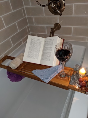 Newly remodeled master bathroom with 6 ft soaker tub. Rain and hand held shower.