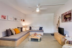 All our apartments have a 32" smart ROKU TV that works with Wifi, to use with Netflix and other online TV providers.  Please note we do not have cable.