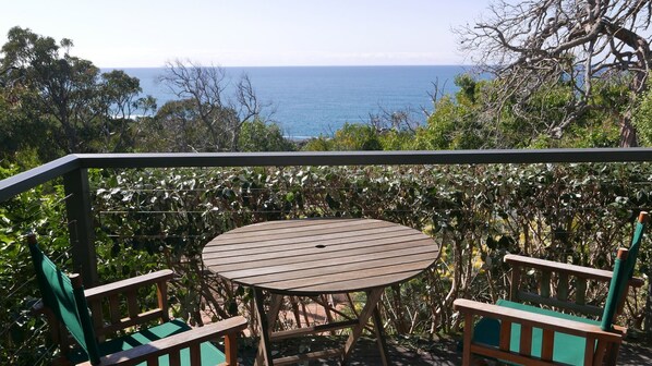 Dining on a sunny deck while watching the whale migration.