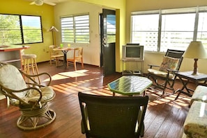 Open living/dining area with water views 