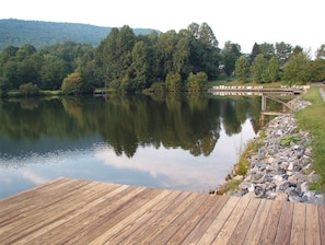 View of large pond from dock at upper level