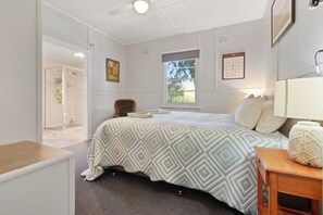 @nd bedroom with king size bed