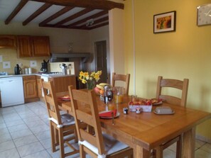 The spacious kitchen diner with fully fitted kitchen