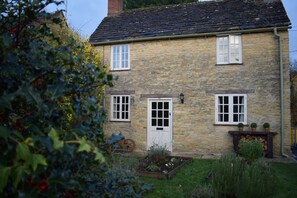 Wintry view of No.32 from its front cottage-style garden