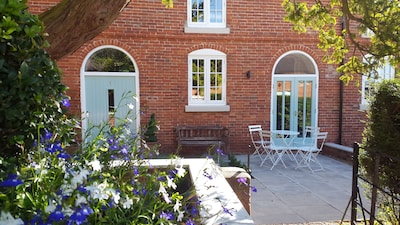 A delightful mews cottage within the private grounds of Breedon Hall