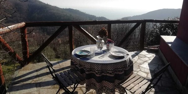 Breakfast with the best view on the sea and green hills. 