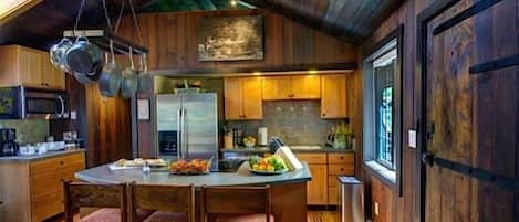 Come gather in the Kitchen & enjoy the mountain rustic charm of the warm wood 