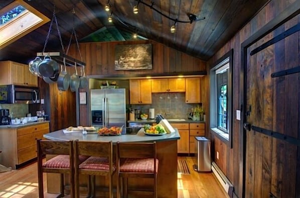 Come gather in the Kitchen & enjoy the mountain rustic charm of the warm wood 