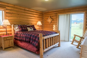 Traditional cabin-style bedrooms provide a cozy place to relax and enjoy the scenery.
