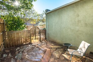Enclosed patio off small bedroom. for pet or child safety .