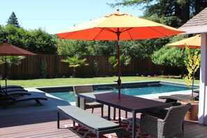 Outdoor dining area located just steps away from the kitchen.