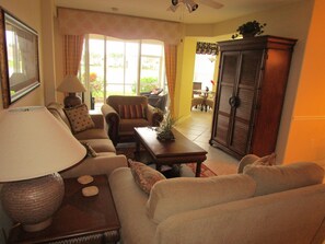 Living Room with enclosed Entertainment Center