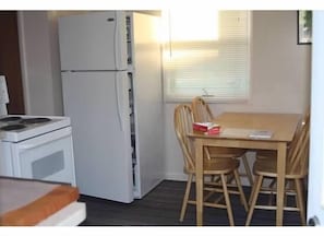 another kitchen view, seating for 4 in kitchen and 4 in dining room.