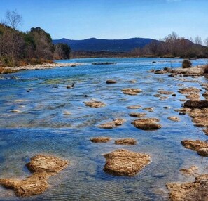 The Nueces River - flowing nicely through the back of the property.