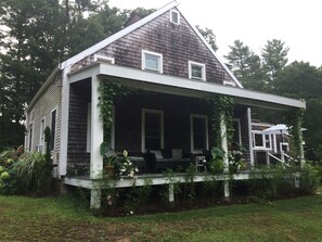 New Covered Porch on west side overlooking Vegetable garden and yard 