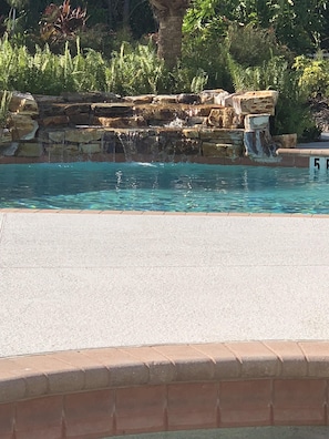 Waterfall element in pool