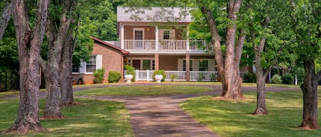 Located on 14.5 acres at the end of a scenic tree lined driveway.