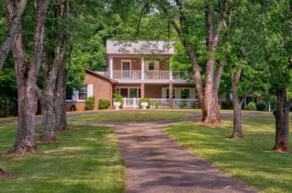 Located on 14.5 acres at the end of a scenic tree lined driveway.