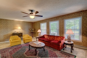 The bright and cheery formal living room