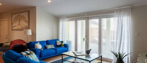 Living room with walkout to Ocean View Deck