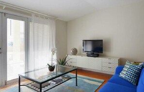 Living room with walk out to private ocean view terrace