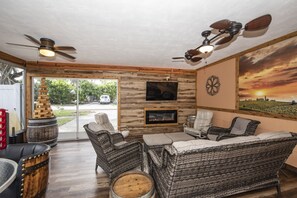 450 sf foosball playroom with 4 fans and a pass-through breeze.  