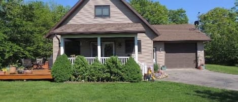 FRONT VIEW WITH DECK AND GARAGE