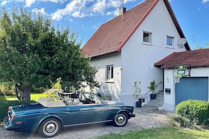 Private house surrounded by large garden + two parking spaces. Car not included.