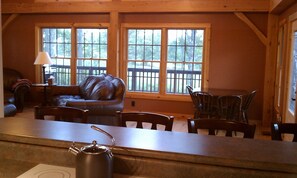Kitchen looking into the great room and dining area over the bar.