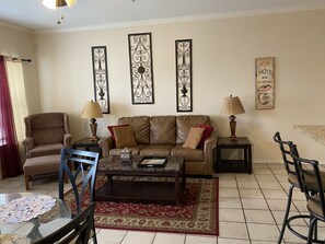 Kick back and relax in our open living room with sleeper sofa and flat screen TV