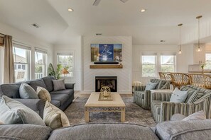 Top-Level Living Room with Deck Access