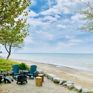 Fire bowl and seating by the lake
