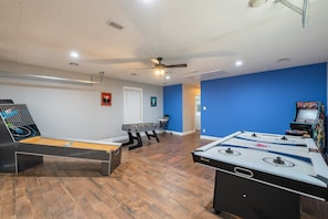Game Room with Hocky table, Foosball table, arcade and more fun games