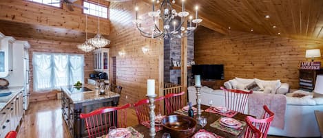 Stunning view of dining room, kitchen and family room