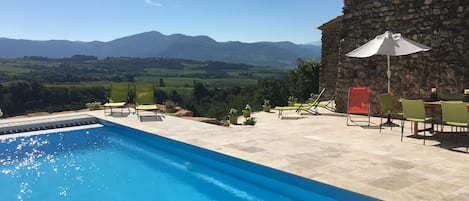 Pool and terrace with seating area