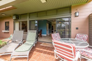 Enjoy outdoor dining for four on the lanai, with lounge chairs and a partial ocean view—your own private slice of Maui.