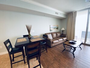 Kick back and relax in our open living area with balcony access!