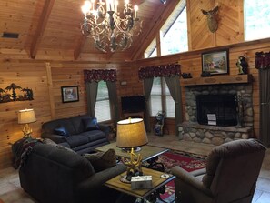 Woodburning Fireplace in Cozy Open Living Room