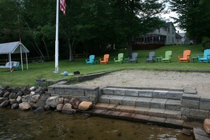 Your very own sandy beach with steps for gradual entry into water.