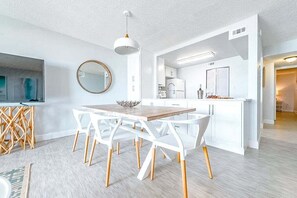Modern dining area with an open-concept design and stylish decor.