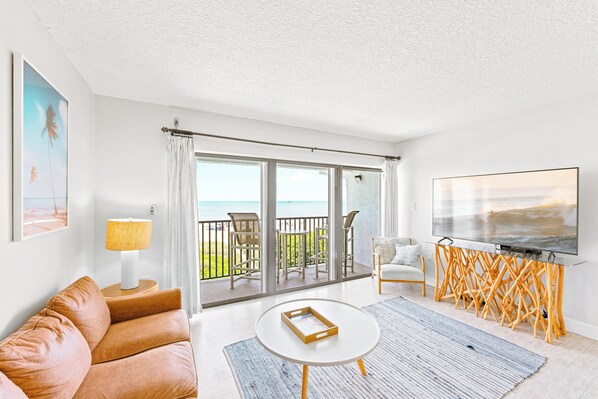 Cozy oceanfront living room with breathtaking views and natural light.