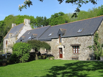 A converted milking parlour with heated swimming pool in large safe garden