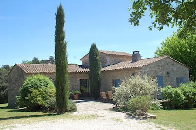 Character stone house with swimming pool surrounded by olive trees
